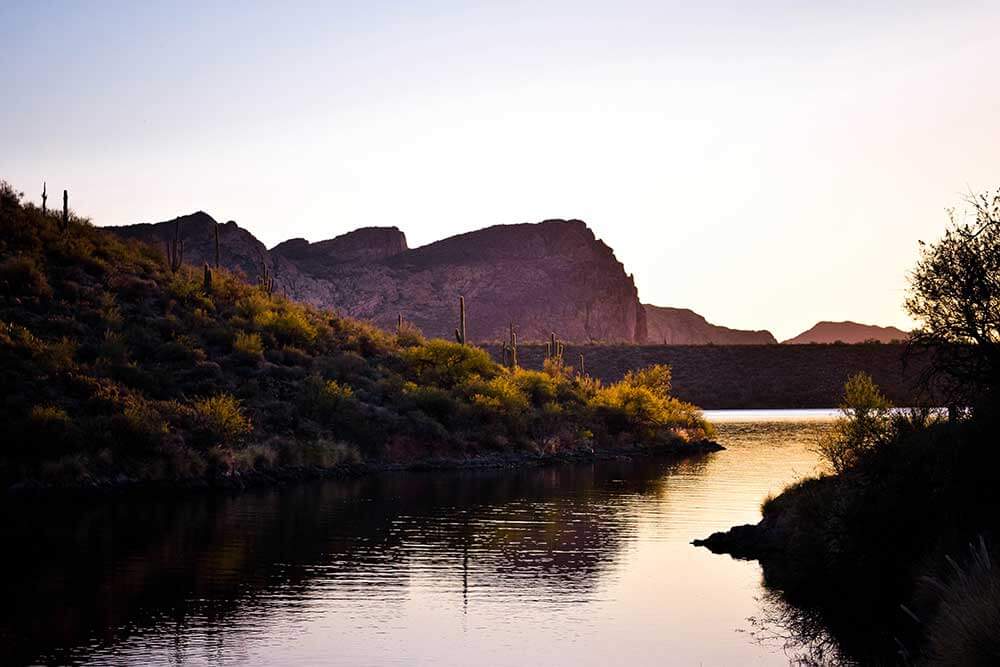 A scenic photo of a lake in Arizona during golden hour.